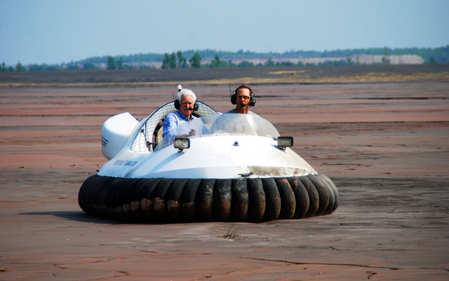 Neoteric commercial hovercraft utilized in dust suppression at iron ore mine in Hibbing, MN.