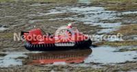 Hovercraft on flooded rice farm