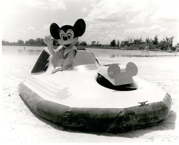 Mickey Mouse pilots the Le Mere hovercraft at Epcot Center