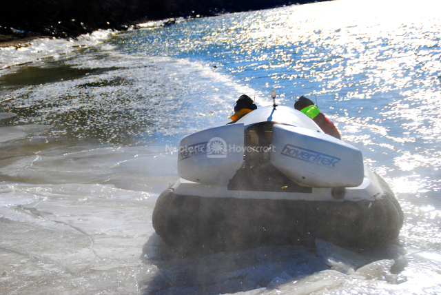 Picture hovercraft flying over ice