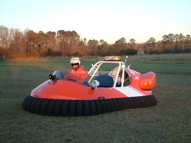 Dr. Miller Poses In His US Coast Guard Hovercraft Design