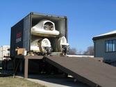 Three Kits Are Loaded Into Container