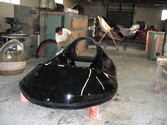 New black body depicted shortly after removal from body mold, and prior to washing and buffing.