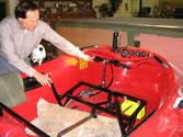 Prior to upholstery installation forward seat and controls checked for freedom and proper operation.