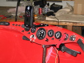 Overall view of complete instrument panel and forward dual safty grab handles.