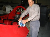 Installation of search light in mount bracket and checking for freedom of movement.