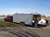 Wylie Officials Supervise Loading into Enclosed Trailer
